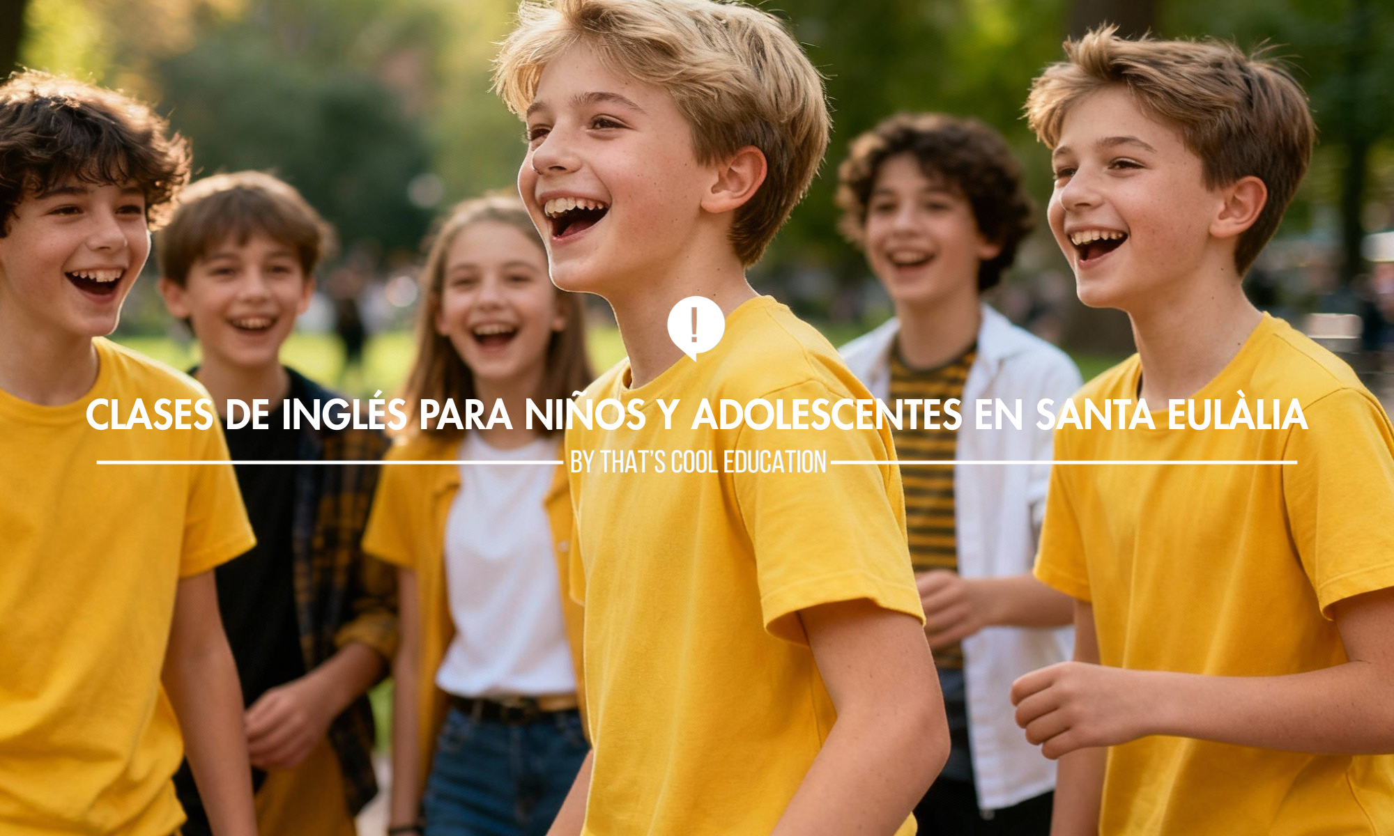 Grupo de niños y adolescentes sonriendo en clases de inglés en Santa Eulàlia, L'Hospitalet.